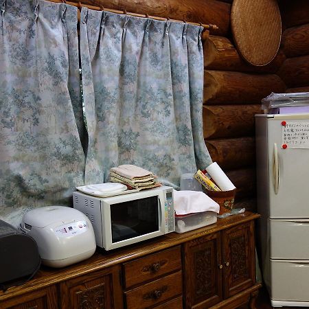 Log Pension Izumigamori Motobu Extérieur photo